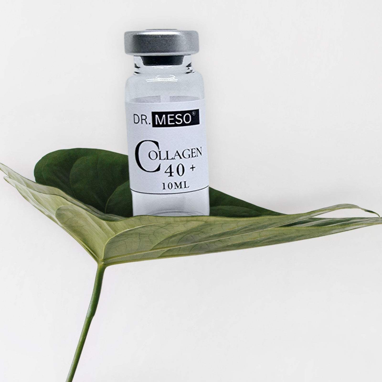 Dr. MESO 40+ Vial sitting on a leaf