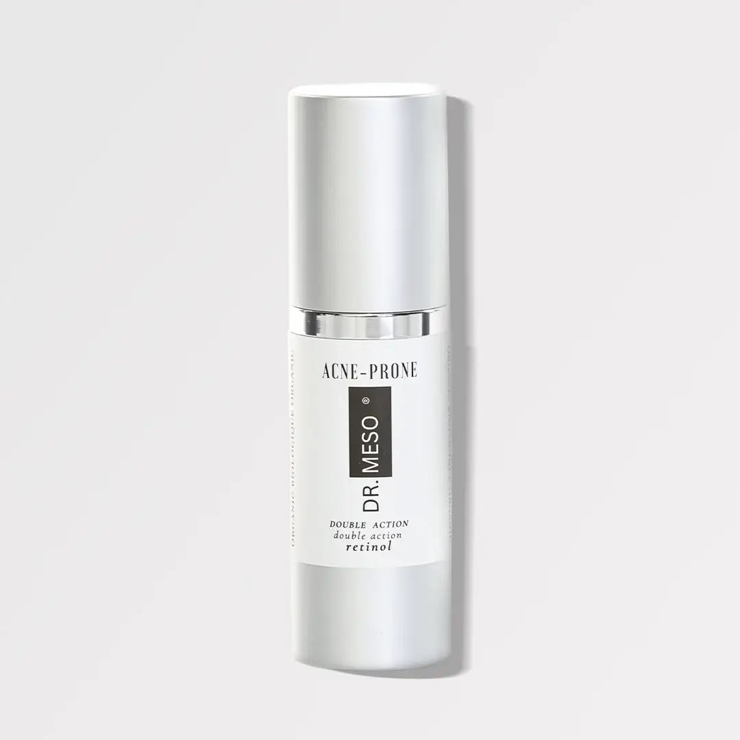 Bottle of retinol serum for acne-prone skin with dropper.